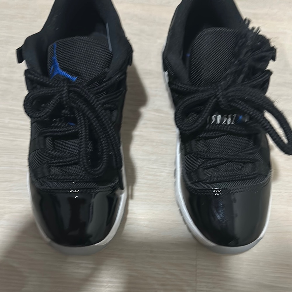 Black Sneakers with Blue Accents